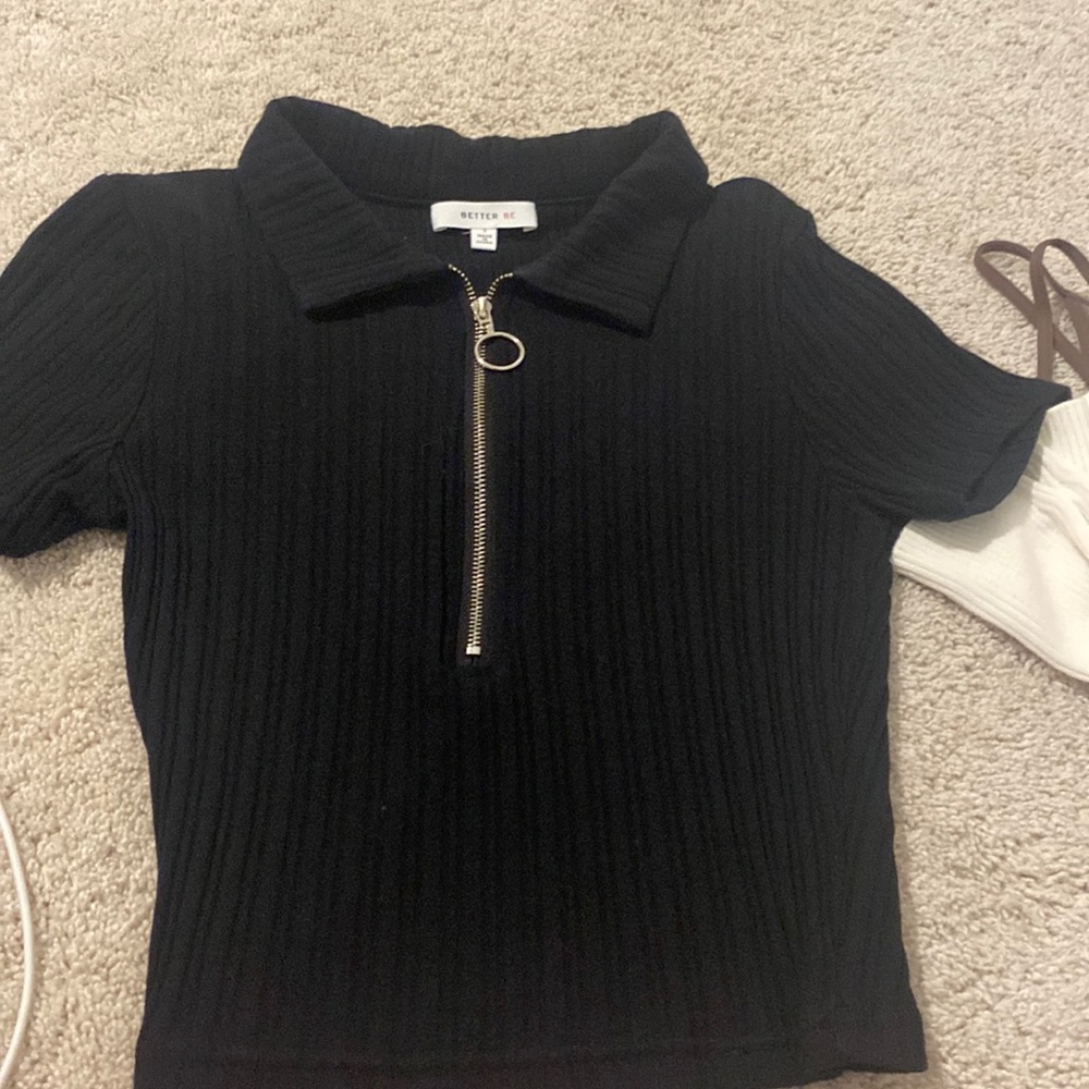 Black collared top with gold zipper
